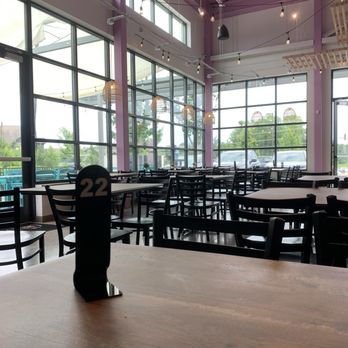 The Crazy Mason Milkshake Bar - inside and outside seating. There are small, kid sizes and to go options. You keep the glass mason jars. - Desserts Near Me - Concord, North Carolina