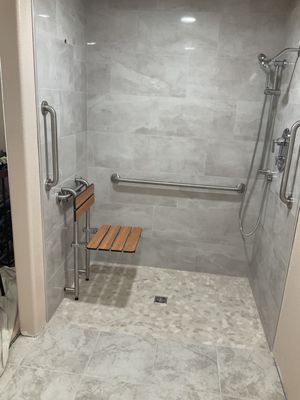 Curbless Showers - Say goodbye to stepping over barriers—our curbless, no-threshold showers are built with aging-in-place and accessibility in mind. Featuring lifetime leak-proof guarantees, custom tile, built-in niches, and elegant glasswork. Ideal for anyone seeking safety, comfort, and spa-like beauty in their bathroom. Curbless Showers - Say goodbye to stepping over barriers—our curbless, no-threshold showers are built with aging-in-place and accessibility in mind. Featuring lifetime leak-proof guarantees, custom tile, built-in niches, and elegant glasswork. Ideal for anyone seeking safety, comfort, and spa-like beauty in their bathroom.