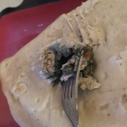 Johnson's Food Warehouse - Mold on the bottom of a calzone I bought from the store. Had to pry it open to see how far deep it went into the crust.