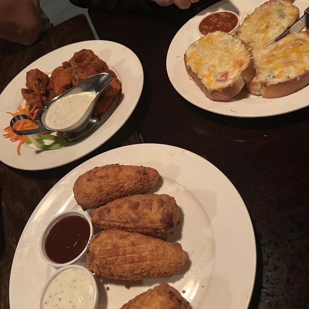 Stuffed Jalapeno Peppers, Dusted Chicken Wings, Garlic Bread with Cheese Stuffed Jalapeno Peppers, Dusted Chicken Wings, Garlic Bread with Cheese