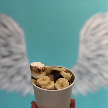 Snowee Rolls - a person holding a cup of ice cream - Ice Cream & Frozen Yogurt Near Me - Morgan Hill, California