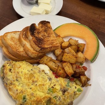 Pescatore Trattoria - Sausage omelet with potatoes and sourdough toast. - Italian Near Me - San Francisco, California Pescatore Trattoria - Sausage omelet with potatoes and sourdough toast. - Italian Near Me - San Francisco, California