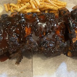 Full slab of barbecue beef ribs dinner