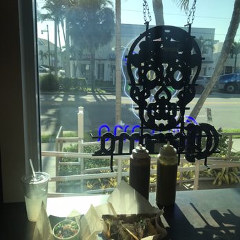 El Sid Taqueria - Looking outside, take note of all the beautiful trees in the evening - Mexican Near Me - Vero Beach, Florida