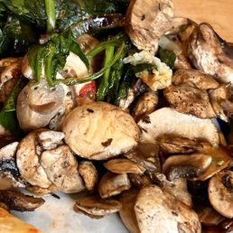 Raw mushrooms in omelette