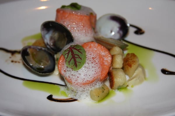 Photo of Aqua - San Francisco, CA, US. coho salmon w/ cockles, sourdough gnocchi, black garlic