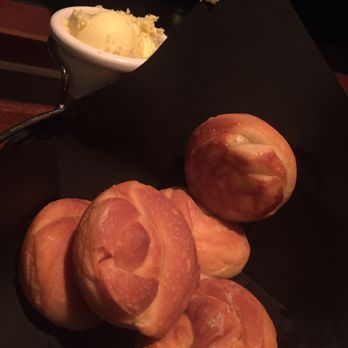 Guy Fieri's Kitchen + Bar - Mmmmm homemade yeast rolls and butter. - Steakhouses Near Me - Council Bluffs, Iowa Guy Fieri's Kitchen + Bar - Mmmmm homemade yeast rolls and butter. - Steakhouses Near Me - Council Bluffs, Iowa