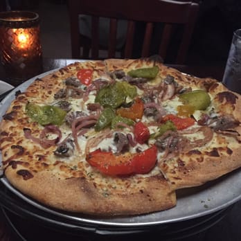 Bellini's Italian Eatery - Sausage, caramelized onions, and pepper pizza - Italian Near Me - Latham, New York Bellini's Italian Eatery - Sausage, caramelized onions, and pepper pizza - Italian Near Me - Latham, New York