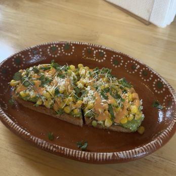 Con Amor Bakery & Cafe - Elote avocado toast - Bakeries Near Me - Waterloo, Iowa Con Amor Bakery & Cafe - Elote avocado toast - Bakeries Near Me - Waterloo, Iowa