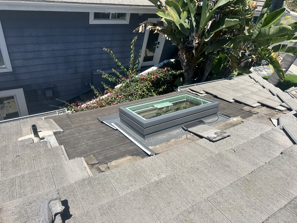 Slide of Rod's Roofing