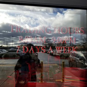 Trader Joe's - Hours posted on door - Grocery Near Me - Kent, Washington