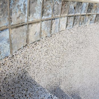 Step Into Liquid Pool & Spa - After. Gorgeous tile and smooth mini pebble by the steps. - Pool & Hot Tub Service Near Me - Torrance, California Step Into Liquid Pool & Spa - After. Gorgeous tile and smooth mini pebble by the steps. - Pool & Hot Tub Service Near Me - Torrance, California
