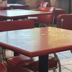 None of the tables in this picture are wiped down. It was like that the entire visit.