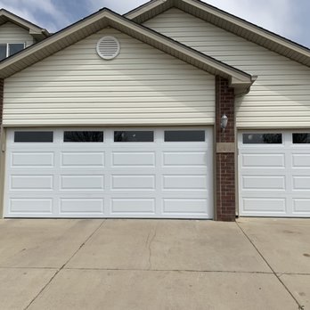 Spring Kings Garage Doors - Two Long Panel Garage Doors - Garage Door Services Near Me - Fort Collins, Colorado Spring Kings Garage Doors - Two Long Panel Garage Doors - Garage Door Services Near Me - Fort Collins, Colorado