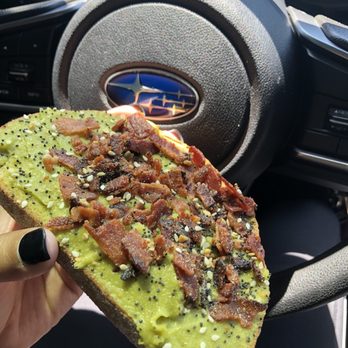 Dunkin' Donuts - Avocado toast on sourdough topped with bacon - Donuts Near Me - Lancaster, California Dunkin' Donuts - Avocado toast on sourdough topped with bacon - Donuts Near Me - Lancaster, California