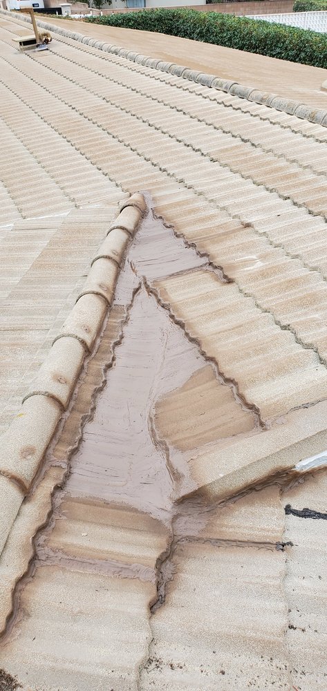 Slide of Three Clovers Roofing