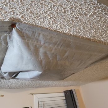 Green Coast Roofing and Solar - The ceiling cover from the worker falling that has been up for weeks now. - Roofing Near Me - Naples, Florida Green Coast Roofing and Solar - The ceiling cover from the worker falling that has been up for weeks now. - Roofing Near Me - Naples, Florida