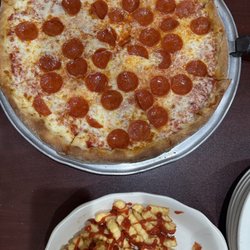 Vino's Pizza & Grill - Xl Pepperoni pizza and French Fries