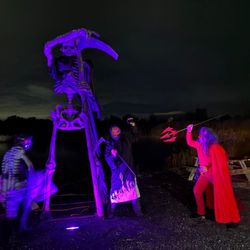 Lincoln Hill Farms - A tall, grim reaper statue and another grim reaper and a devil. I'm not sure where the ghost came from.