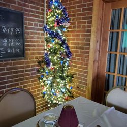 City Seafood and Steakhouse - Corner tree patriotically adorned.