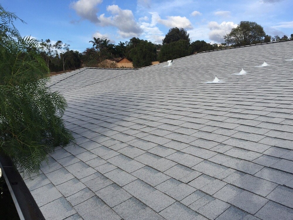 Slide of Grand Pros Roofing
