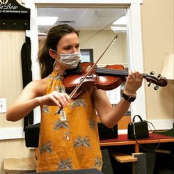 Lisle Violin Shop - Testing room - there were great little printed tips for bow selection posted as well as some sheet music available for testing.