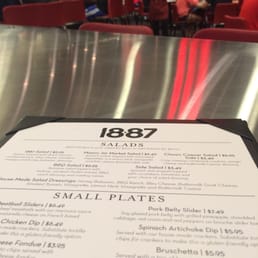 a menu on a table in a restaurant