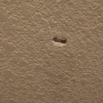 Elite Flooring Plus - hole in wall from them opening the door too hard . that is the imprint of the lock in the doorknob. - Building Supplies Near Me - Las Vegas, Nevada Elite Flooring Plus - hole in wall from them opening the door too hard . that is the imprint of the lock in the doorknob. - Building Supplies Near Me - Las Vegas, Nevada