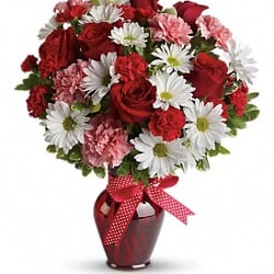 Always Flowers By Crenshaw - Here is the online picture that they advertise, and I thought I was buying. This is the premium Hugs and kisses.