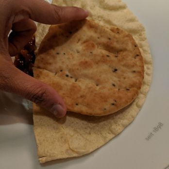 Hiltl - Naan size for reference - Vegetarian Near Me - Zürich, ZH Hiltl - Naan size for reference - Vegetarian Near Me - Zürich, ZH