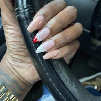 D&B Nails - We switched it up and did one spooky nail and may my coffin nails a neutral color instead of white. - Nail Salons Near Me - Ferndale, Michigan