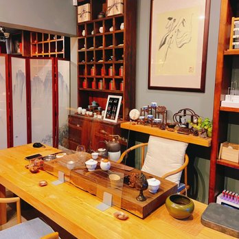 VAN CHA - a tea room with a wooden table and chairs - Tea Rooms Near Me - Vancouver, British Columbia VAN CHA - a tea room with a wooden table and chairs - Tea Rooms Near Me - Vancouver, British Columbia