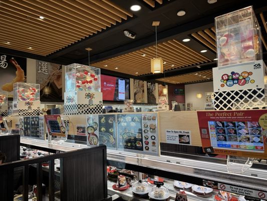 Kura Revolving Sushi Bar by null