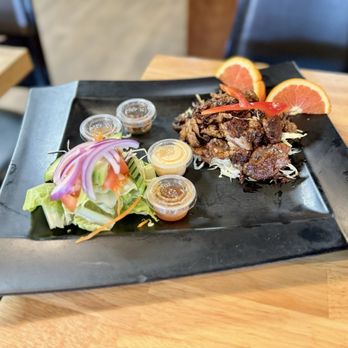 Panoy Bistro - a plate of food on a table - Laotian Near Me - Grass Valley, California