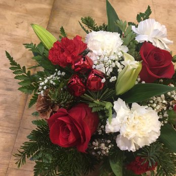 Flourishing Gifts - Cute Christmas arrangement for center piece the owner let me take a pic of :) - Floral Designers Near Me - Philadelphia, Pennsylvania Flourishing Gifts - Cute Christmas arrangement for center piece the owner let me take a pic of :) - Floral Designers Near Me - Philadelphia, Pennsylvania