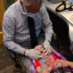 myKIDSdds - Dr. Mark Kogut performing a lap exam.