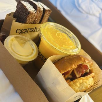 Eggslut - Bacon Bacon, Egg & Cheese w/ Fresh Orange Juice and French toast - Breakfast & Brunch Near Me - Las Vegas, Nevada Eggslut - Bacon Bacon, Egg & Cheese w/ Fresh Orange Juice and French toast - Breakfast & Brunch Near Me - Las Vegas, Nevada