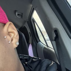 Atmosphere Tattoo Gallery - Surface Tragus
