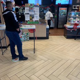 a man standing in front of a counter