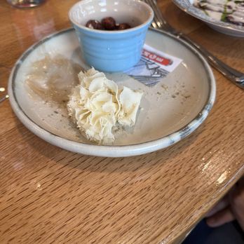 L'Orange - Half-eaten cheese rosette (oops) - Salad Near Me - Portland, Oregon