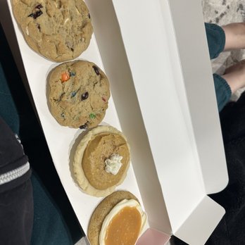Crumbl - Upland - (L to R)- White cranberry, M&Ms, Pumpkin Pie, Salted Caramel - Bakeries Near Me - Upland, California Crumbl - Upland - (L to R)- White cranberry, M&Ms, Pumpkin Pie, Salted Caramel - Bakeries Near Me - Upland, California