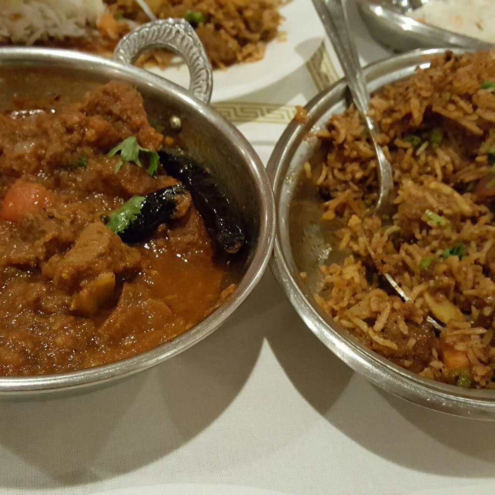 Taj Grill - Lamb biryani to the right - Indian Near Me - Buffalo, New York Taj Grill - Lamb biryani to the right - Indian Near Me - Buffalo, New York