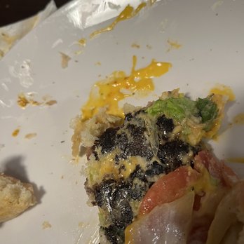 Guy Fieri's Flavortown Kitchen - The burned burger - Food Delivery Services Near Me