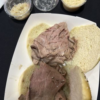 Buffalo River Works - Two roast beef on weck sandwiches, with horseradish in the little container - Venues & Event Spaces Near Me - Buffalo, New York