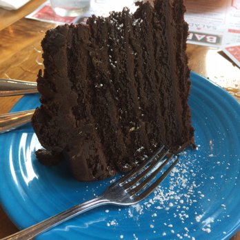 Barnaby's Cafe - Chocolate Addition cake, $7.50. Chocolate chip cookie in back, $2. - American Near Me - Houston, Texas Barnaby's Cafe - Chocolate Addition cake, $7.50. Chocolate chip cookie in back, $2. - American Near Me - Houston, Texas