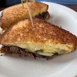 On The Rocks - Grilled cheese with spare rib meat, and pickles.