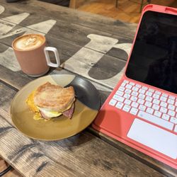 Breakfast sandwich & honey cinnamon latte