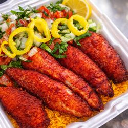 Lakeside Gyros - Vibrant Fish Rice laid on top of golden saffron rice served with side of salad
