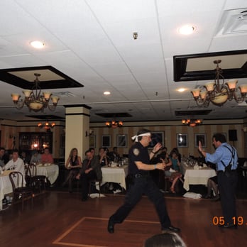 Murdered by the Mob Dinner Theater - a cop dancing - Dinner Theater Near Me - New York, New York Murdered by the Mob Dinner Theater - a cop dancing - Dinner Theater Near Me - New York, New York
