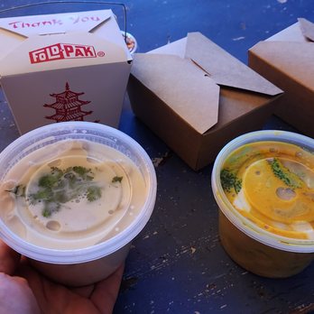 Little Thai Place - a hand holding a cup of soup and a take out box - Thai Near Me - Victoria, British Columbia Little Thai Place - a hand holding a cup of soup and a take out box - Thai Near Me - Victoria, British Columbia